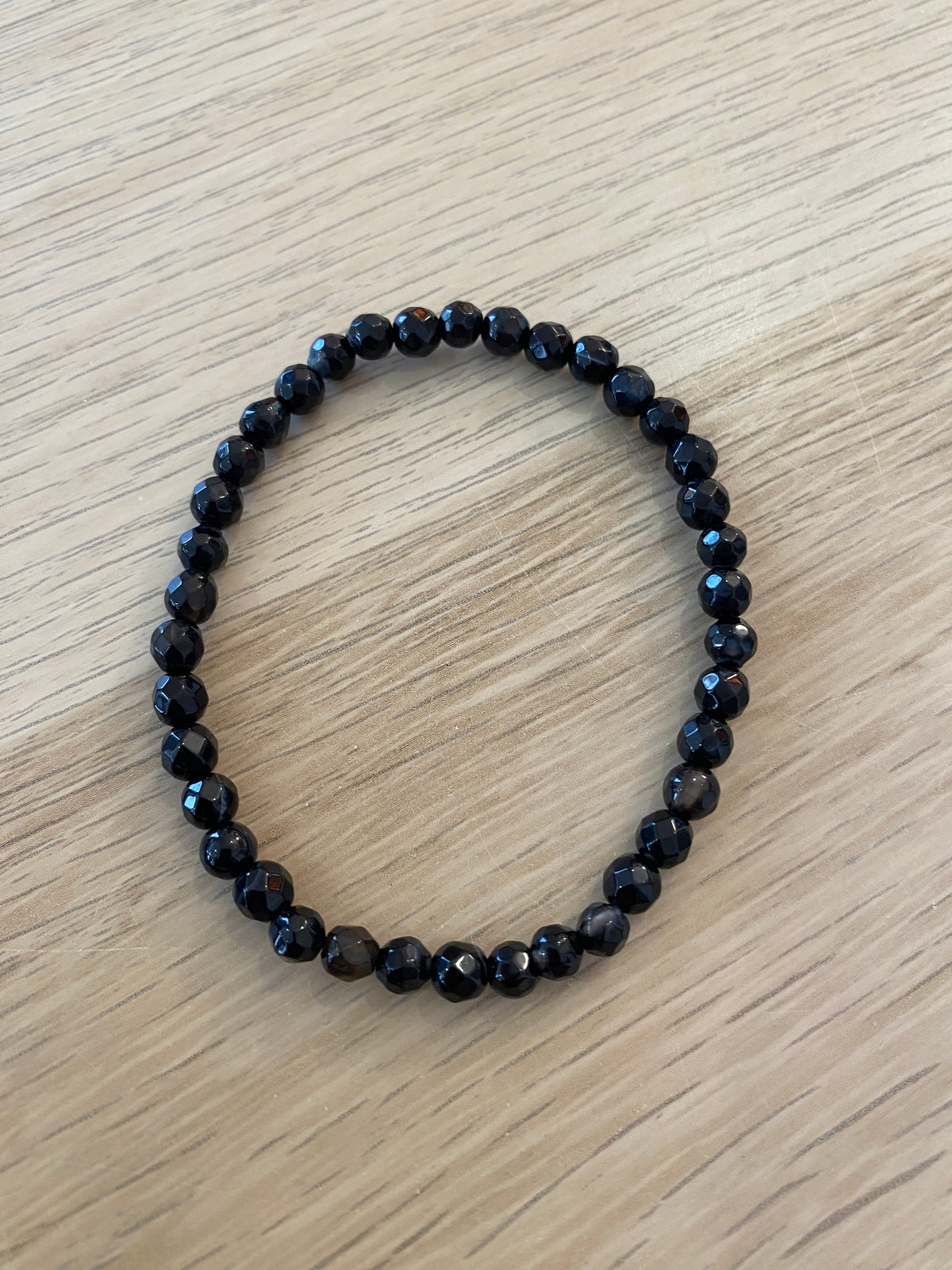 Bracelet perle en obsidienne facettée - 4 mm
