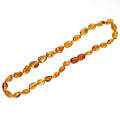 Collier d'ambre foncé